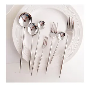 Detail view of 7-piece silver stainless steel flatware set in Portuguese style with mirror finish