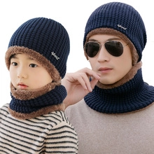 Navy blue knitted hat and scarf set with thick brown fleece lining for winter warmth
