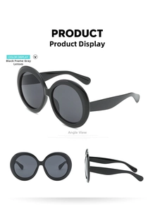 Detailed views of oversized retro round sunglasses with black frames and gray lenses