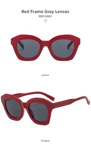 Front and 45-degree angle views of vintage red cat eye sunglasses with gray lenses
