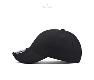 Side view of black fitted baseball cap showing six-panel crown and spandex fabric texture