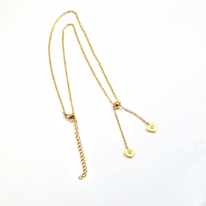 18K gold plated titanium necklace featuring asymmetric micro-pave zircon heart pendants
