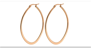 Detailed close-up of rose gold oval hoop earrings featuring a flat geometric metal finish
