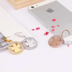 Boucles d'oreilles ange en acier titane avec halo de cristal en or, argent et rose