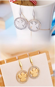 Détails de boucles d'oreilles ange rondes avec cristaux en finition or et argent