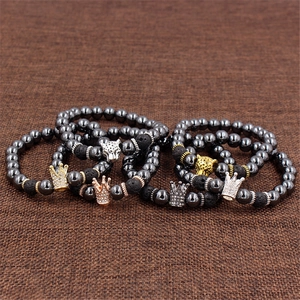 Hematite and lava stone bracelets with diamond-encrusted crowns and leopard head charms