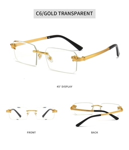 Detail view of gold rimless sunglasses featuring panther hinge accents and metal temples