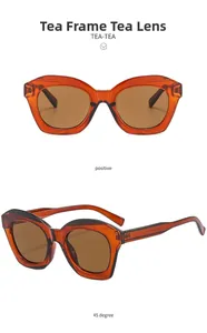 Detail view of tea-colored cat eye sunglasses with translucent frames and specifications