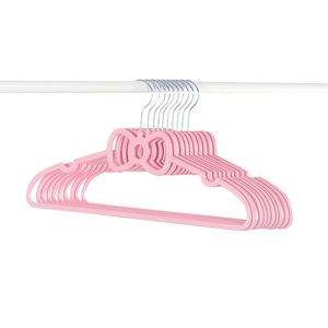 Pink heart-shaped plastic clothes hangers with bow design and metal rotating hook