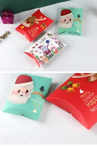 Detail view of foldable Christmas reindeer pillow boxes for candy and small gift packaging