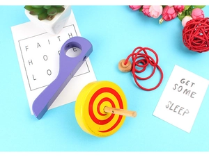 Classic wooden spinning top toy set with red pull string and colorful spiral pattern