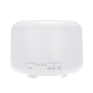 Close-up of control buttons for light and mist timer on white ultrasonic humidifier