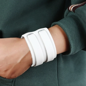 Retro wide white leather punk cuff bracelet with multi-strap design shown on wrist