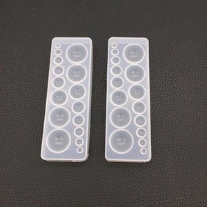 Macro dello stampo in silicone con cavità rotonde per la creazione di gioielli in resina