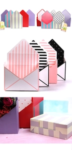 Close-up of assorted colorful envelope-shaped paper flower gift boxes with stylish patterns