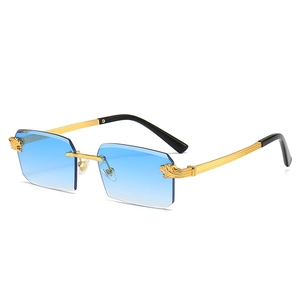 Luxury rimless sunglasses with blue gradient lenses and golden panther head temple design