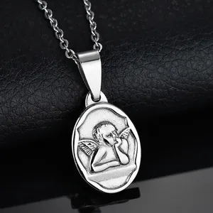 Minimalist stainless steel oval pendant necklace featuring a vintage Cupid angel relief