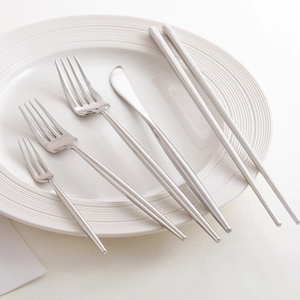 Portuguese style 304 stainless steel cutlery set with forks, knife and chopsticks in a dish