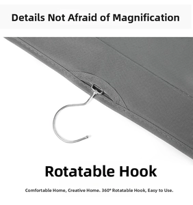 Detail of 360-degree rotating stainless steel hook on grey mesh hanging bag organizer