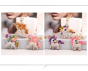 Detail of enameled unicorn keychain featuring rhinestones and colorful alloy finish