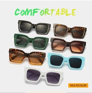 Close-up of vintage square PC sunglasses in multiple colors with three rivet details