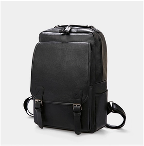 Detail view of black PU leather backpack with vintage buckles and side zipper compartment