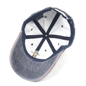 Internal view of navy washed cotton baseball cap with anchor embroidery and metal buckle