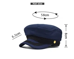 Detailed size guide for the navy wool baker boy hat showing dimensions and brim measurements