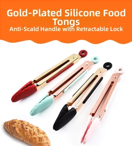 Detail view of gold-plated silicone food tongs with heat-resistant handles and locking clip