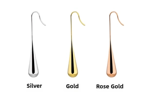 Detailed close-up of water drop earrings in silver, gold, and rose gold finishes