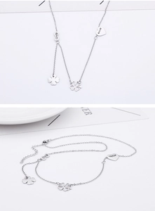 Silver infinity heart and clover pendant necklace chain with polished metallic finish