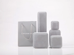 Gray velvet jewelry box set with matching paper gift bag featuring Love For You text