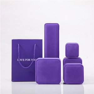 Elegant purple velvet jewelry packaging set including gift boxes and bags for jewelry storage