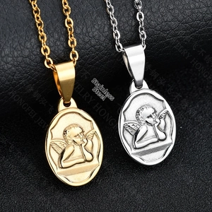 Close-up of gold and silver cherub angel embossed oval pendants on black leather