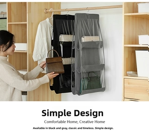 Detail of hanging handbag organizer with transparent PVC compartments in wardrobe