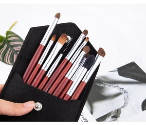 Detailed view of 10pcs pony hair eyeshadow brush set in a black felt storage pouch