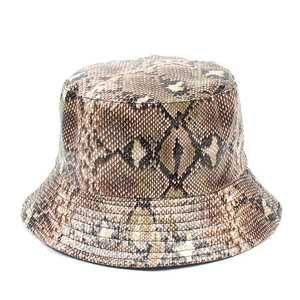 Close-up of the brown snakeskin pattern and textured PU fabric on a bucket hat detail