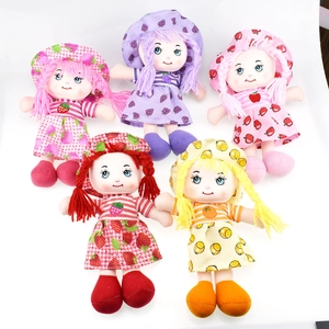 Detailed top-down view of five colorful fruit-themed plush dolls with matching hats