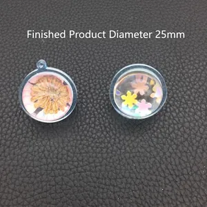 Spherical resin pendants with dried flowers and sequins, 25mm diameter display
