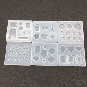 Macro view of 6-piece DIY resin silicone molds featuring geometric and decorative shapes