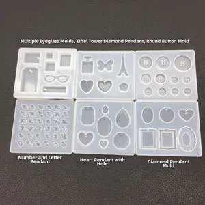 Macro view of six silicone molds for DIY resin casting including letters and shapes