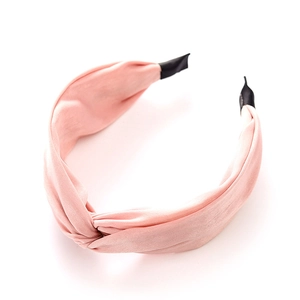 Elegant pink knotted silk headband with glossy satin finish for women hair styling
