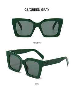 Close-up of green PC sunglasses with three metal rivets and gray lenses in C3 colorway