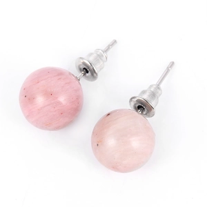Macro shot of 10mm round pink natural stone stud earrings with silver-plated metal butterfly backs