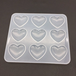 Macro detail of flexible 9-cavity heart silicone mold for resin crafts and DIY soap making