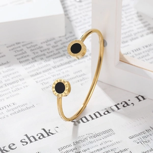 Elegant rose gold stainless steel bangle with roman numerals and black shell inlay