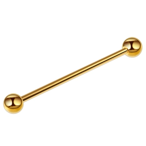 Close-up of a polished gold industrial barbell earring with smooth dual spheres