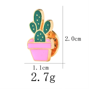 Detailed size and weight view of a cartoon cactus enamel pin with gold and green colors