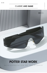 Close-up of frameless wrap-around punk sunglasses with sleek black aerodynamic lines