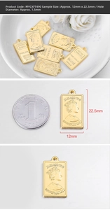 Detail of 12x22.5mm gold coin pendant with Elizabeth II portrait and gold bar texture